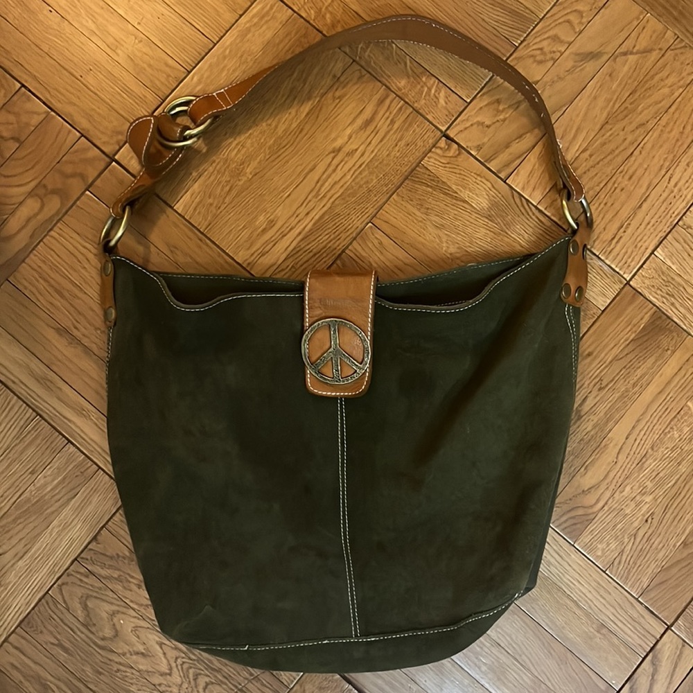 Green suede shoulder bag with peace sign